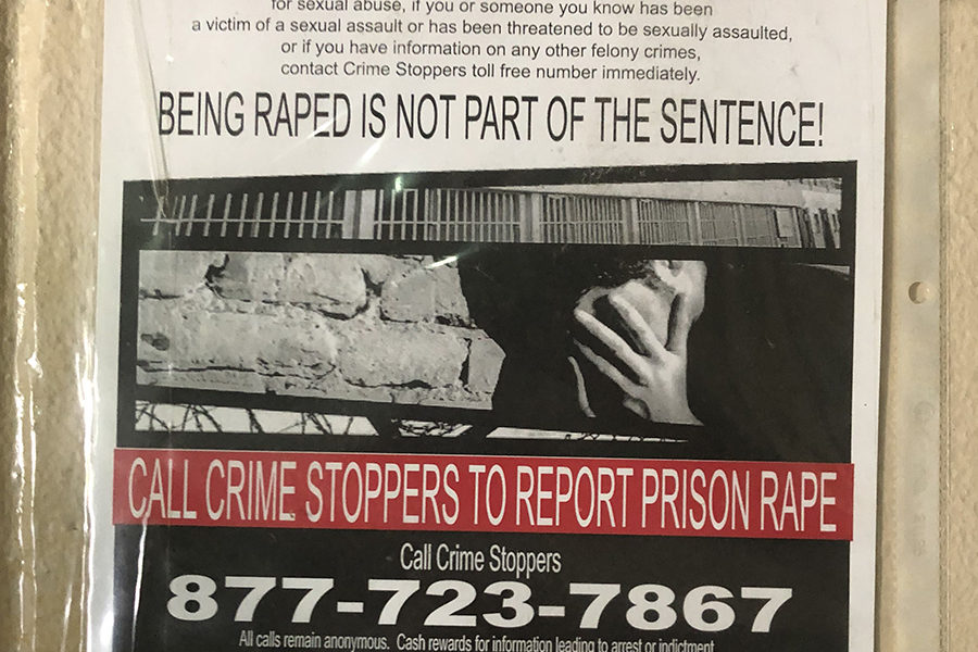 Poster says "Break the Silence!" and "Being Raped is Not Part of the Sentence!" with PREA phone number